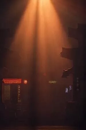 夜色中的城市影院外立面与亮起的排片灯箱